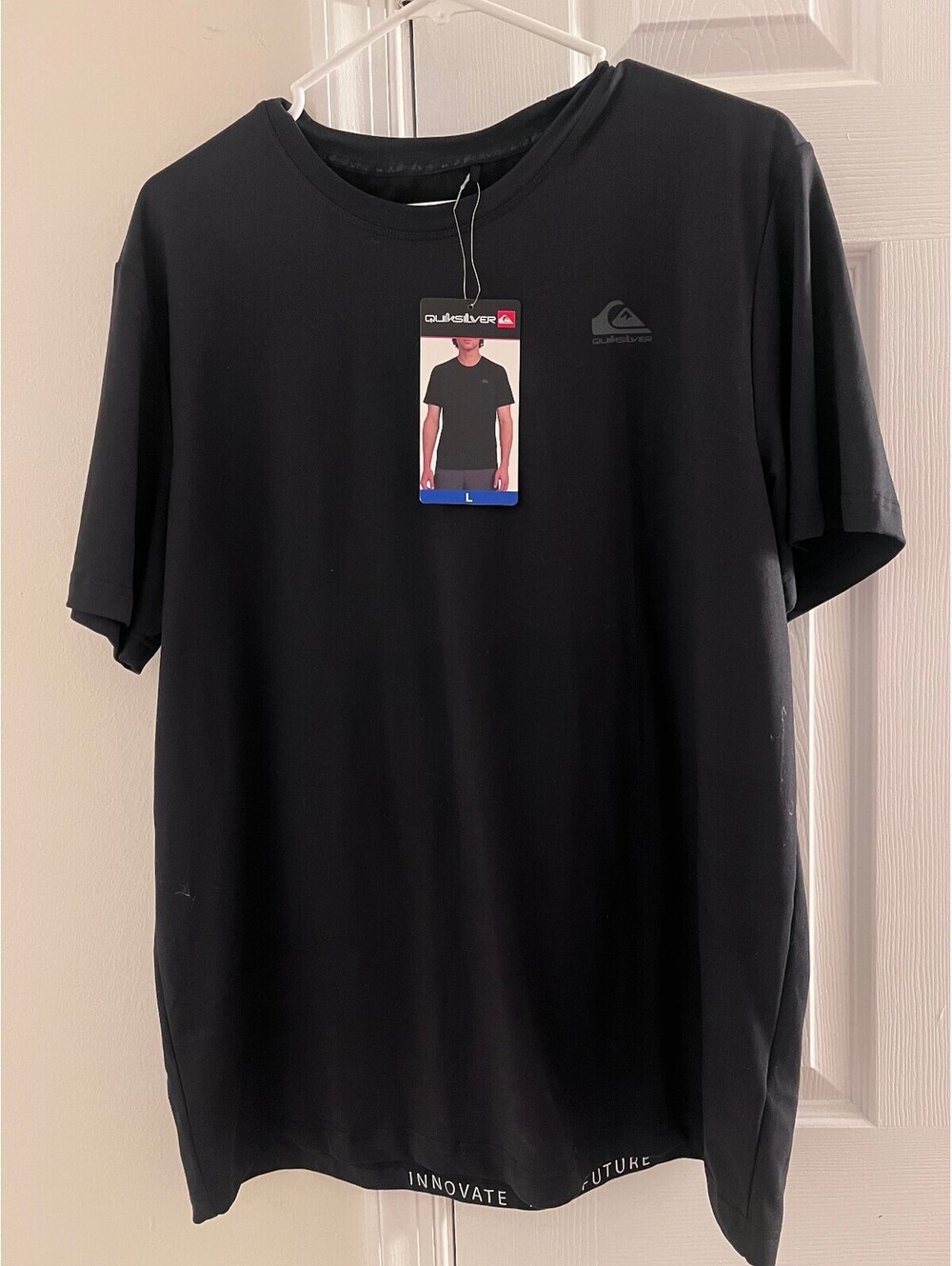 Quicksilver 4 way stretch and moisture wicking shirt size L